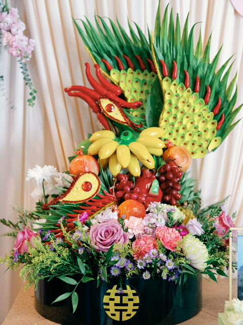 Mâm quả ceremonial trays with fruit and floral arrangements
